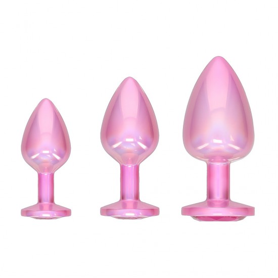 Descubra a sofisticação da International by Ouch! com o Conjunto de Plugs de 3 Peças da Coleção Paris. Com um acabamento rosa deslumbrante e bases incrustadas com joias, estes plugs de alumínio suave combinam luxo e praz