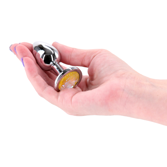 Brinquedo anal leve e cromado, projetado para proporcionar excitação visual e sensual. Feito de alumínio leve e com formato que facilita a penetração, este brinquedo anal seguro para o corpo está disponível em diversas c