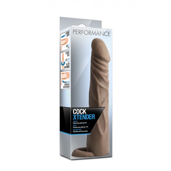 Manga Extensão Pénis c/ Anel Testículos Performance Xtender Castanho Manga para o pénis que lhe aumentará em 6.4cm o tamanho e, ainda, grossura por todo o seu pénis.Em material de dupla densidade que replica a pele de uma forma surpreendente, seguro para o corpo e que rapidamente se a