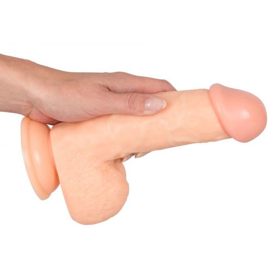 Dildo in a true-to-life, flexible penis shape with pink head, blue veins and testicles. With suction foot. Total length 22 cm, insertion depth 15 cm, Ø 5.1 cm. Material: PVC, phthalate-free according to EU regulation REA