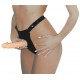 Ouvert-Slip of synthetic leater with adjustable nylon straps. Including deployable dildo of soft, skin-coloured slippy material (18.5cm long, Ø 4 cm). Free of phthalates according to EU regulation REACH.
