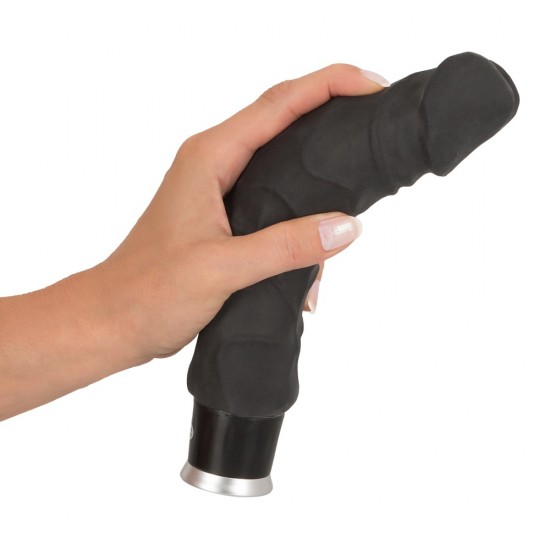 This large black lover will make women go weak at the knees!The flexible realistic looking vibrator with bulging glans doesn´t just look like a real penis, it also feels like that of an exotic lover too because of the sk