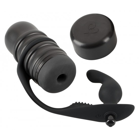 2-in-1: masturbator with a removable anal vibrator. The masturbator has a dotted and grooved pleasure tunnel and can also be removed from the case. The masturbator is open at the end. The anal vibrator has a velvety soft
