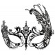 Black metal mask with holes for the eyes and an elastic band at the back. Decorated with glittery rhinestones.